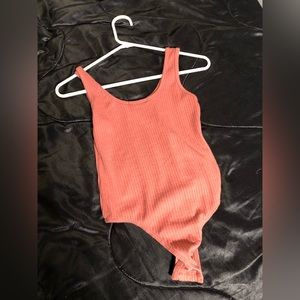 PRETTY LITTLE THING small one pink one piece body suit